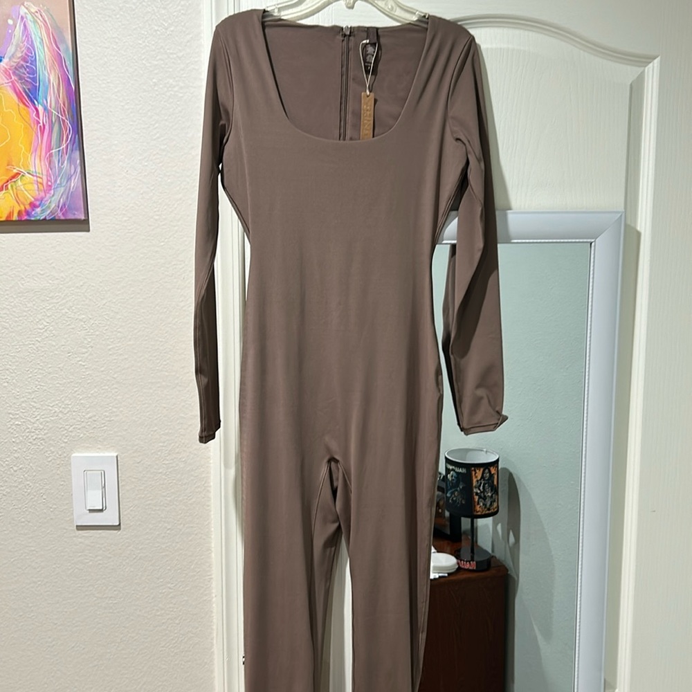 Brown scoop neck long sleeve SKIMS catsuit BRAND NEW with tags